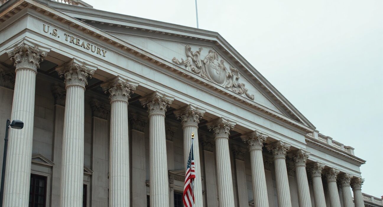 U.S. Treasury building exterior on an overcast day, representing bond market stability amid geopolitical uncertainty.