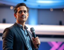 Vercel CEO Guillermo Rauch announcing AI-driven growth and IPO readiness at a tech conference.