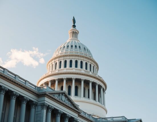 U.S. Capitol building under a clear sky, symbolizing ongoing legislative negotiations on the CLARITY Act.