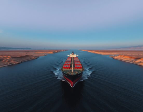 Oil tankers navigating the strategic Strait of Hormuz during heightened geopolitical tensions affecting WTI crude prices.