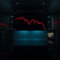WTI crude oil price chart declining on trading screens amid US-Iran diplomatic developments