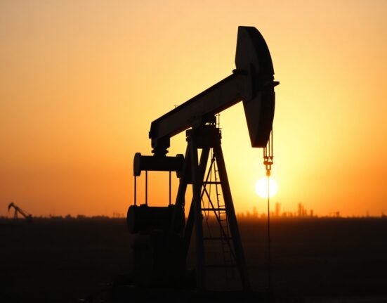Oil pumpjack silhouetted against sunset sky representing WTI crude oil price decline amid US-Iran nuclear talks