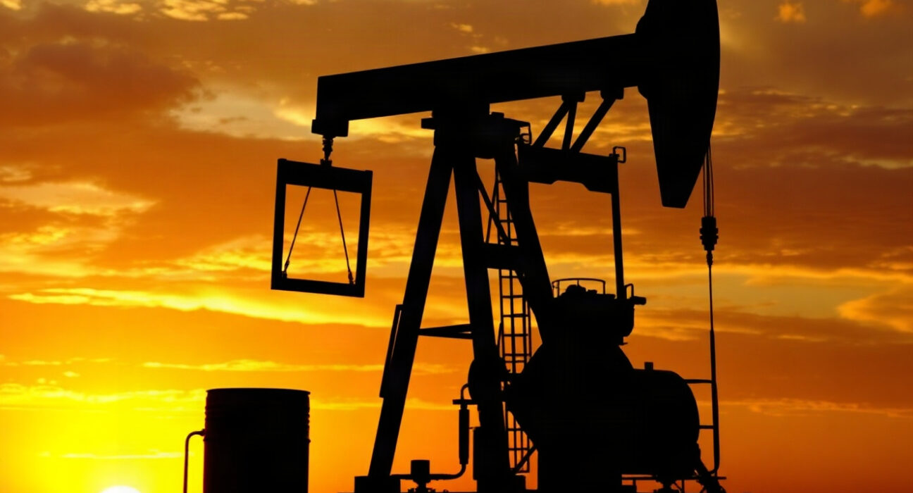 Oil pump jack in an oil field at sunset, representing WTI crude oil market movements