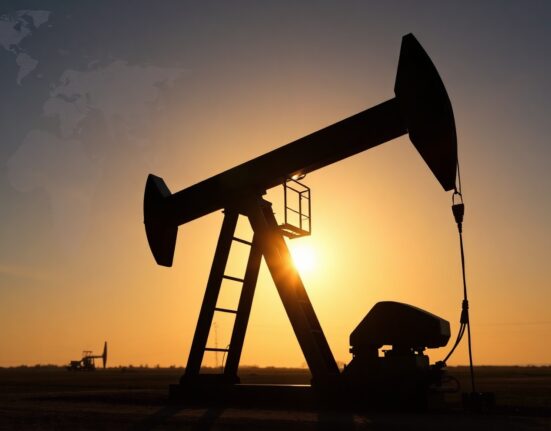 Oil pumpjack silhouetted at sunset, representing WTI crude price movements amid stalled US-Iran nuclear talks.