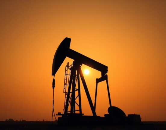 Crude oil pumpjack silhouetted against a dramatic sunset sky representing geopolitical tensions affecting WTI prices