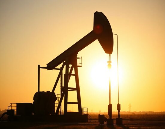 Oil pumpjack at sunset representing WTI supply concerns and price forecast.
