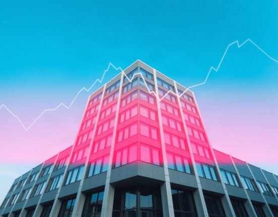 Corporate building with financial graph overlay symbolizing market volatility for Zerostack article